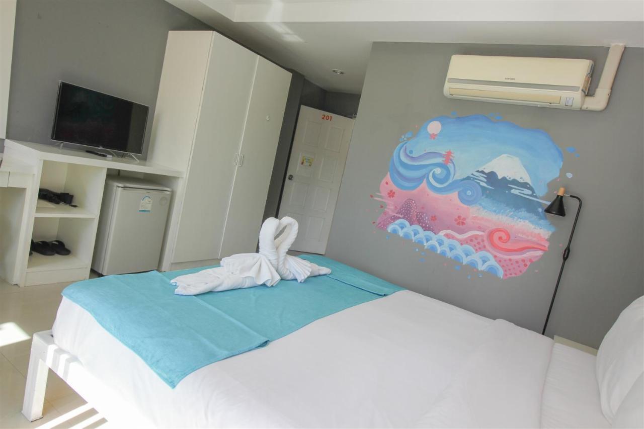 Guan Chao Yin Hotel Patong Esterno foto